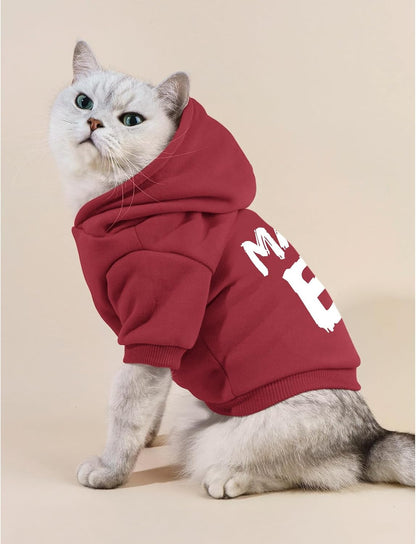 Wine red small puppy hooded sweatshirt made of soft fabric for winter protection.