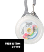 Nite Ize Disc-O Tech pet light cycling through multiple vibrant colors