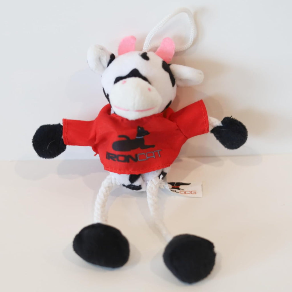 Lightweight cow cat toy with string legs for interactive chasing and batting.