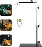Reptile lamp stand set up over a bearded dragon habitat enclosure