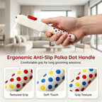 Ergonomic handle pet brush being used for indoor grooming on long hair small animals