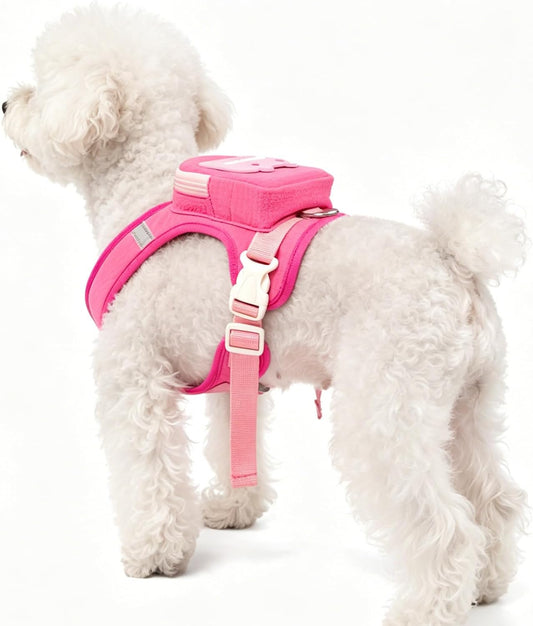 Side view of pink dog harness with storage pocket and leash attachment
