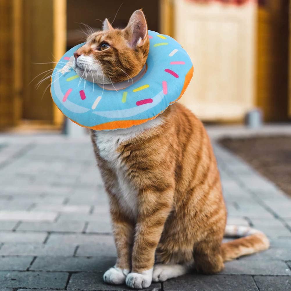 Soft pet recovery collar doubling as a comfortable neck pillow for resting cats.