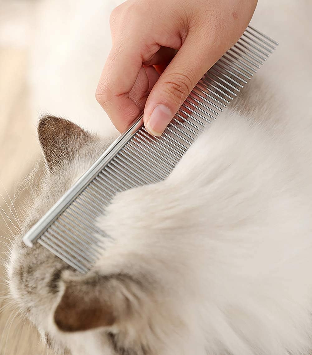 Multicolor pet shedding rake for professional cat and dog grooming.