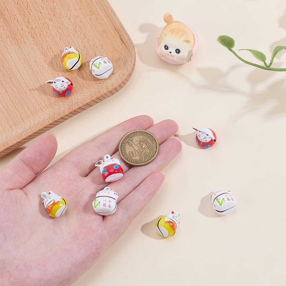 Close up of Japanese Maneki Neko cat charm with key ring