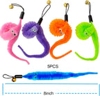 Playful kitten swatting at the dangling colorful caterpillar attachment connected to the extension wand.