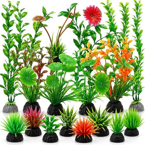 Sixteen piece plastic aquarium decorations kit featuring multi colored lifelike foliage for terrariums.