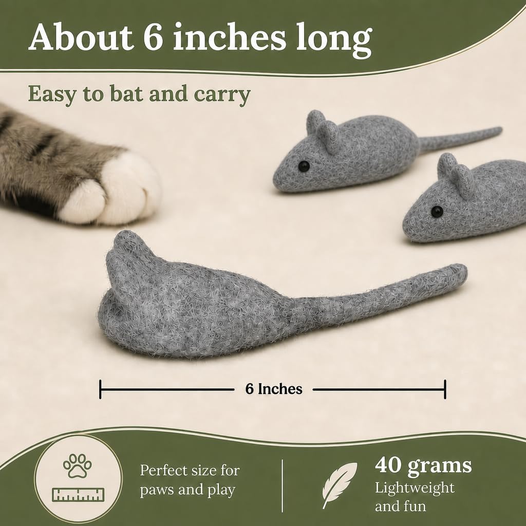 Indoor cat playing actively with an Earthtone Solutions felted wool mouse toy