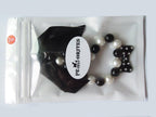 PetFavorites luxury cat collar jewelry featuring adjustable clasp and black ribbon bow.