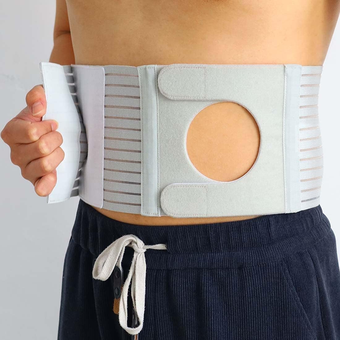 FIRRKEP abdominal medical ostomy belt front view showing the adjustable U-shaped stoma support hole.
