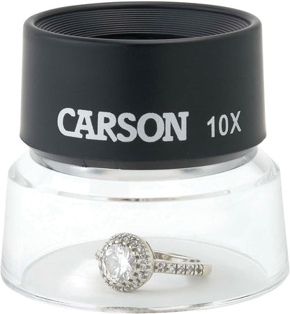 Carson 10x optical loupe showing the black polymer rim and compact design