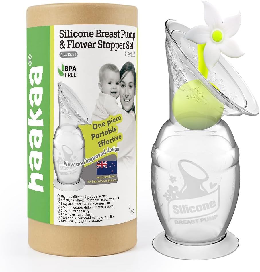 Haakaa manual breast pump front view with suction base and white flower stopper