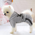 Side profile of a medium sized pet wearing the four legged winter outfit