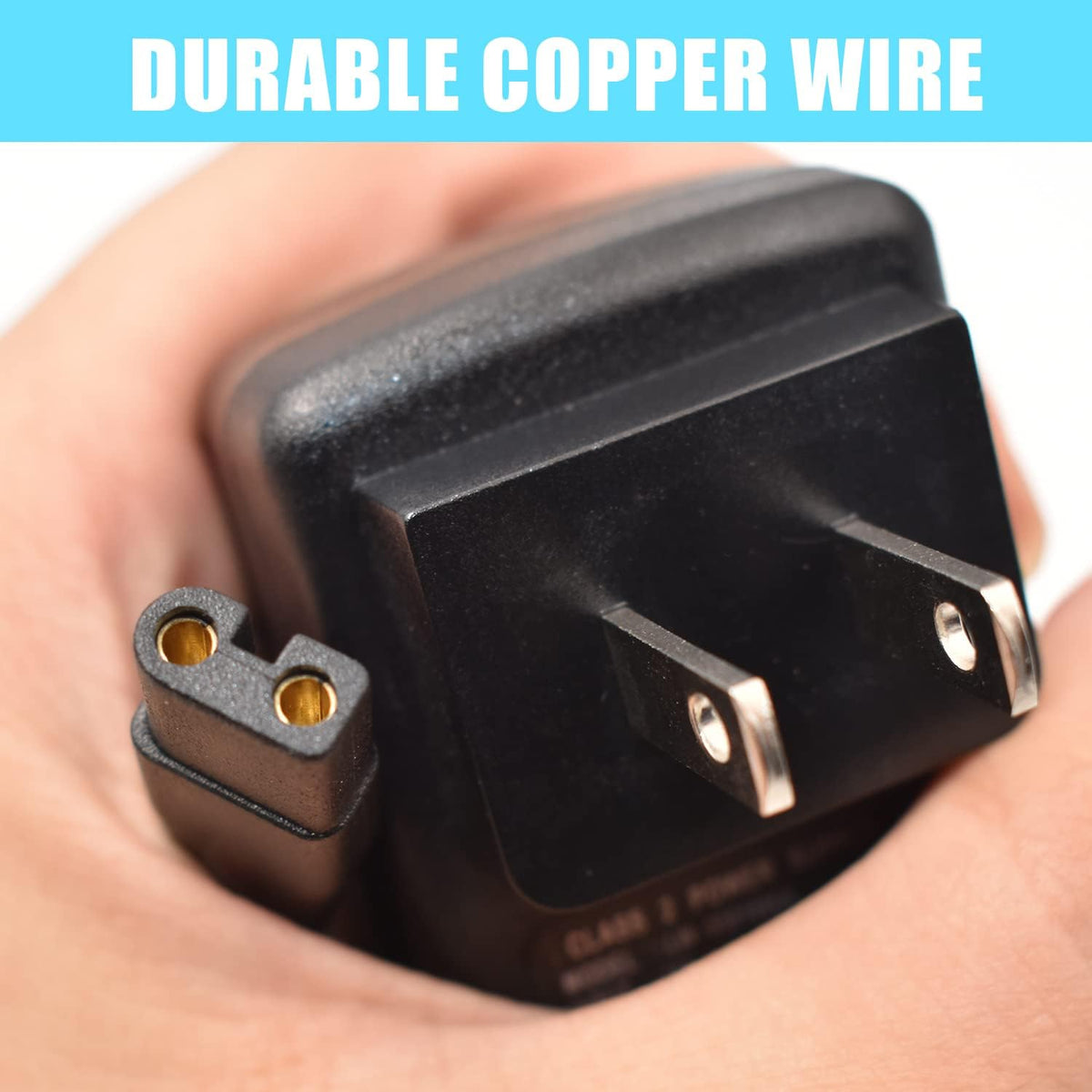 BOEEA power adapter for pet clippers displaying the durable five foot cable insulation.