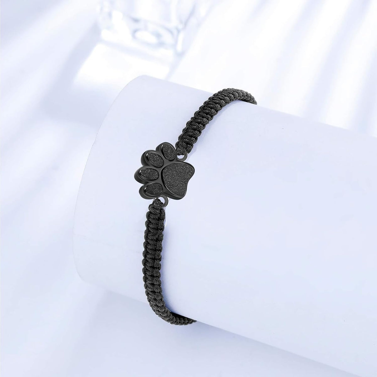 Waterproof stainless steel paw print cremation locket bracelet close up