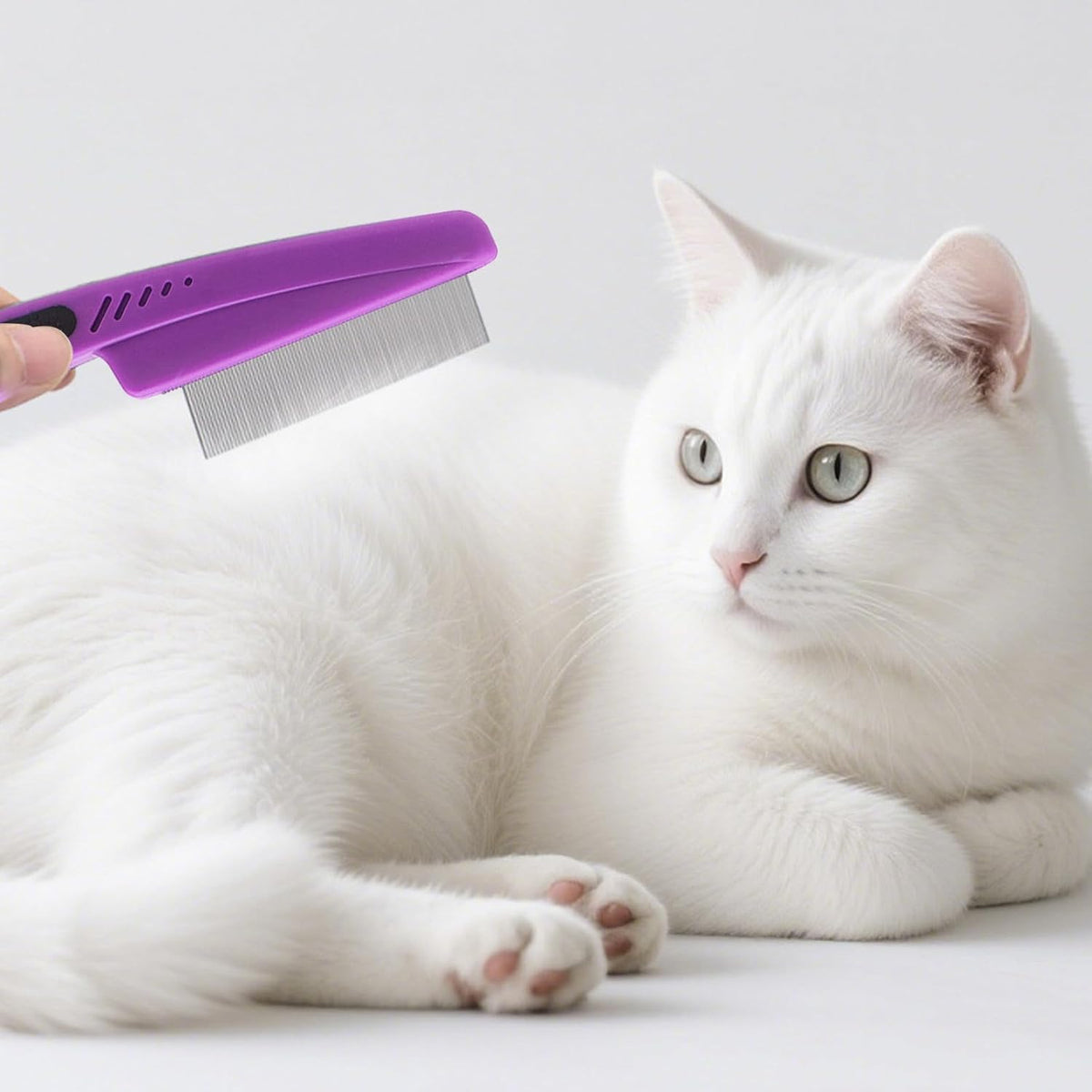 Using Yumflan flea comb on pet fur during grooming