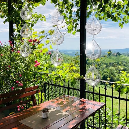 Stainless steel reflective bird deterrent spinning in garden