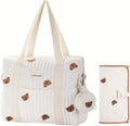 Gobabymart diaper bag front view showing quilted pattern and carry handles.