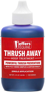 Authentic imported USA livestock hoof hygiene liquid bottle in a stable environment.