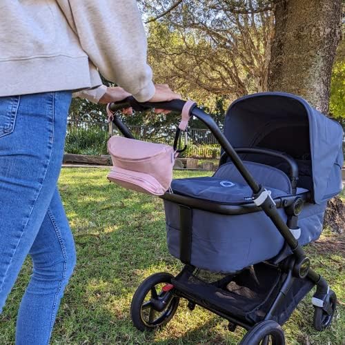 Side profile of Suessie fanny pack diaper bag showing strap