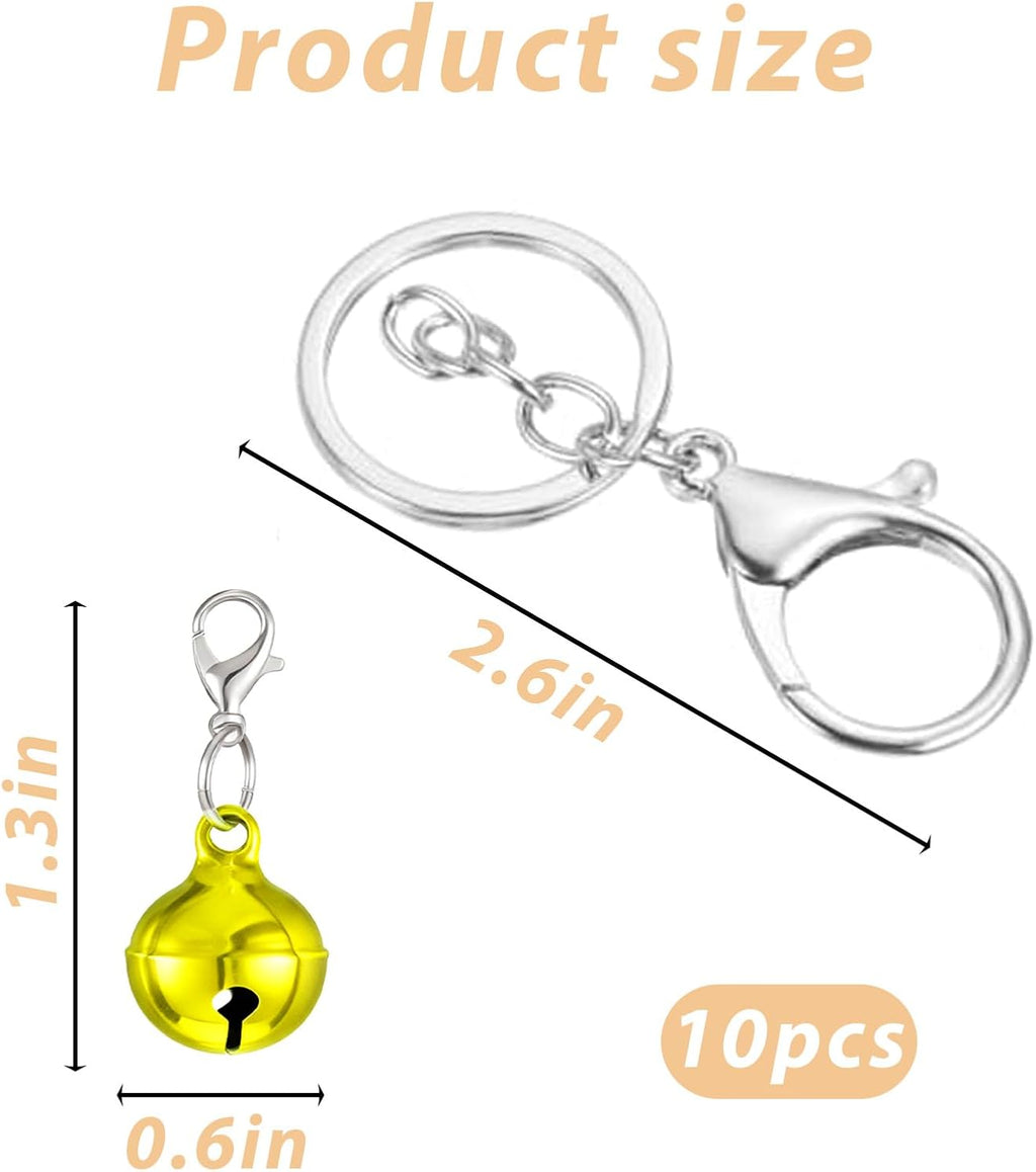Colorful small round jingle bells for cat and dog collars laid out in a neat row