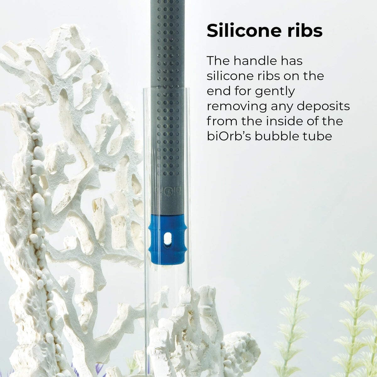 Blue silicone algae pad and brush tool for fish tanks