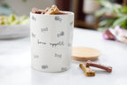 Pearhead pet treat canister showing airtight wooden lid detail