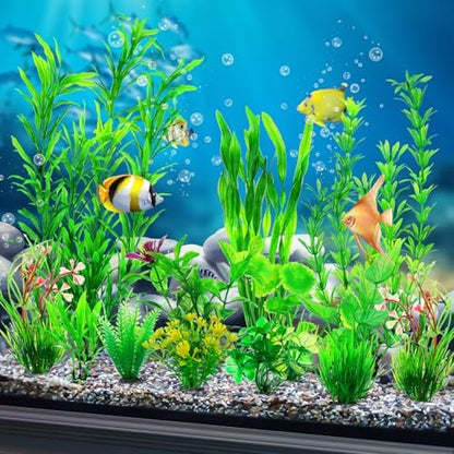 Eleven different styles of non toxic green fish tank plants arranged side by side