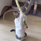 Interactive pet wand toy with ringing bell and fluffy ball