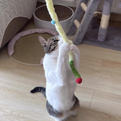 Interactive pet wand toy with ringing bell and fluffy ball
