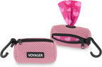Heavy duty dog waste bag holder clipped to a pet harness for outdoor walks.