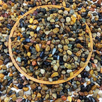 Close up of 1/4 inch natural pea gravel river rocks