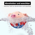 Dog interacting with Geojec blue pig plush motion toy