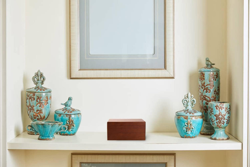 PCS Pet Crematory Supplies Wooden Cremation Urn displayed in an indoor memorial setting
