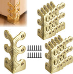 Four piece set of decorative table corner edge covers arranged neatly against a neutral studio backdrop
