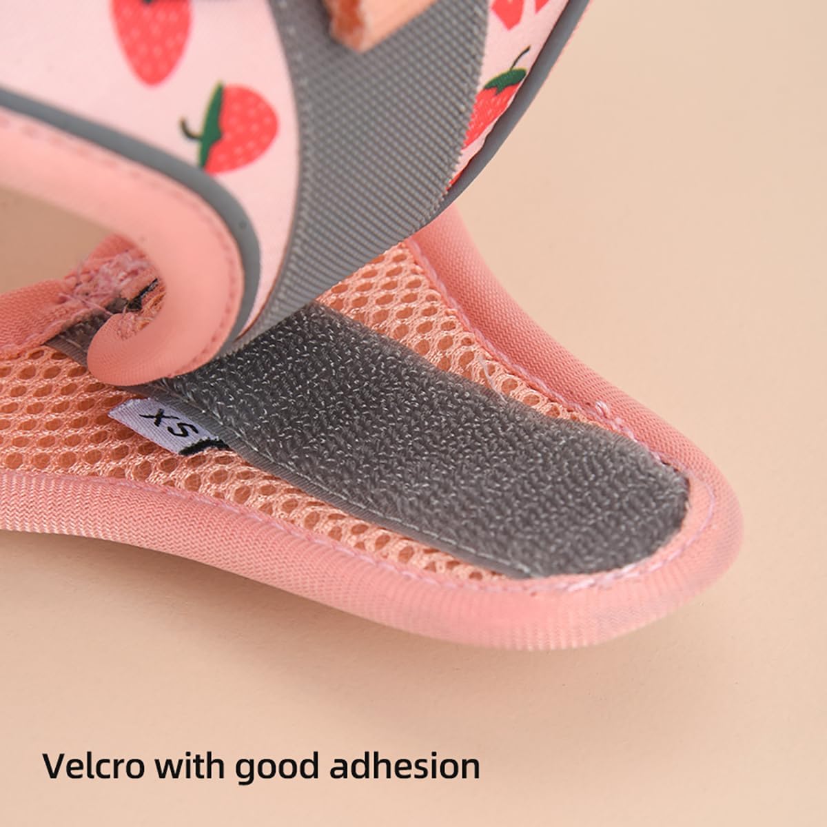Flymind step in cat harness demonstrating quick release safety buckle and hook loop fastener.