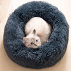 Small dog sleeping in washable anti anxiety round bed