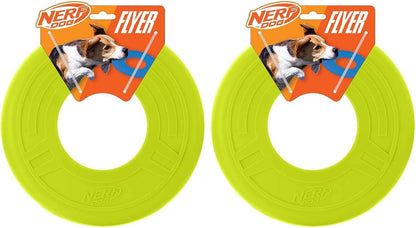 Active dog playing with blue Nerf Dog flying disc