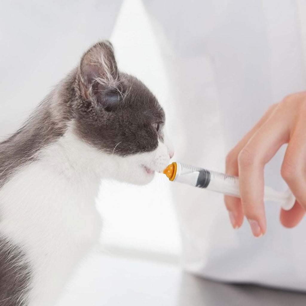Close up view of the precise scale markings on the 10 milliliter animal syringe dispenser.