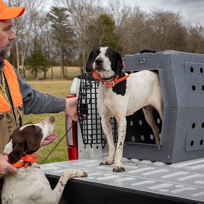 Ruff Land heavy duty impact resistant travel crate showing stackable design and raised floor.