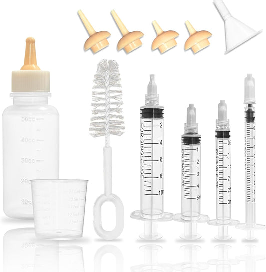 Pups And Pets puppy kitten bottle feeding kit front view showing the seventeen piece newborn pet nursing set