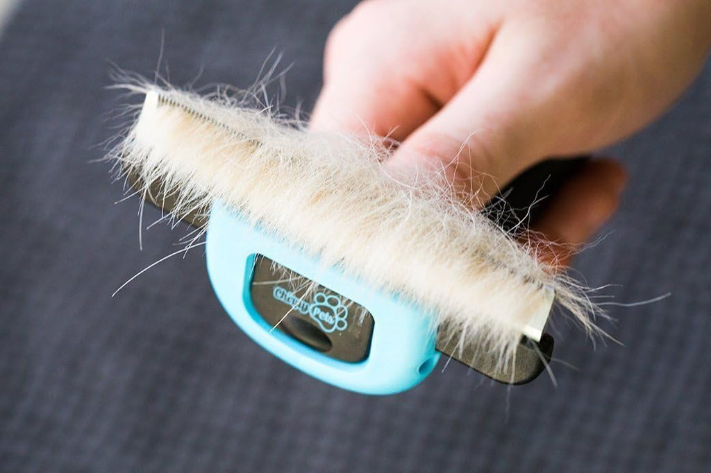 Chirpy Pets grooming brush side angle view