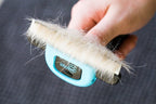 Chirpy Pets grooming brush side angle view