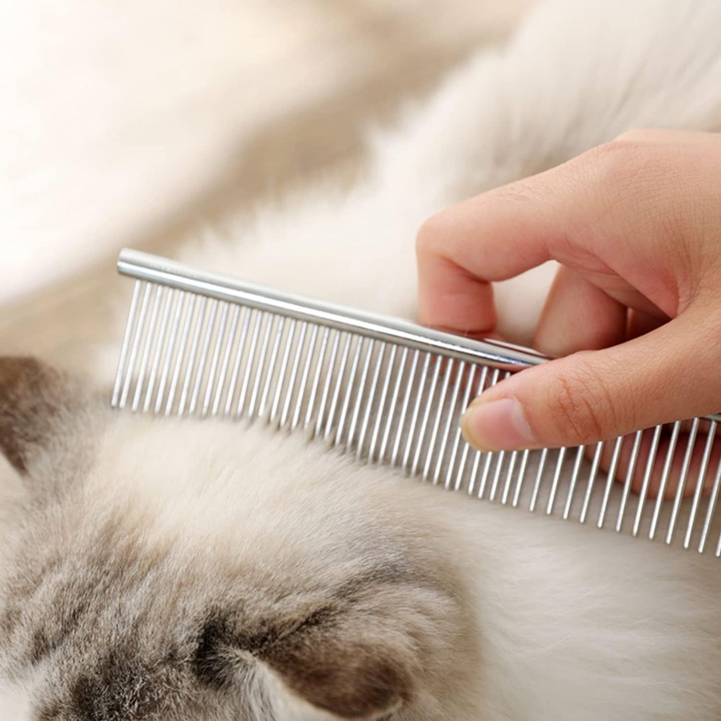 Premium Kopal rustproof metal pet hair comb highlighting the dual density teeth spacing.