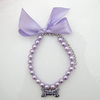Close up view of the adjustable jewelry clasp on the PetFavorites pearl pet costume necklace.