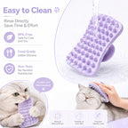Hank pet brush removing loose fur during bath