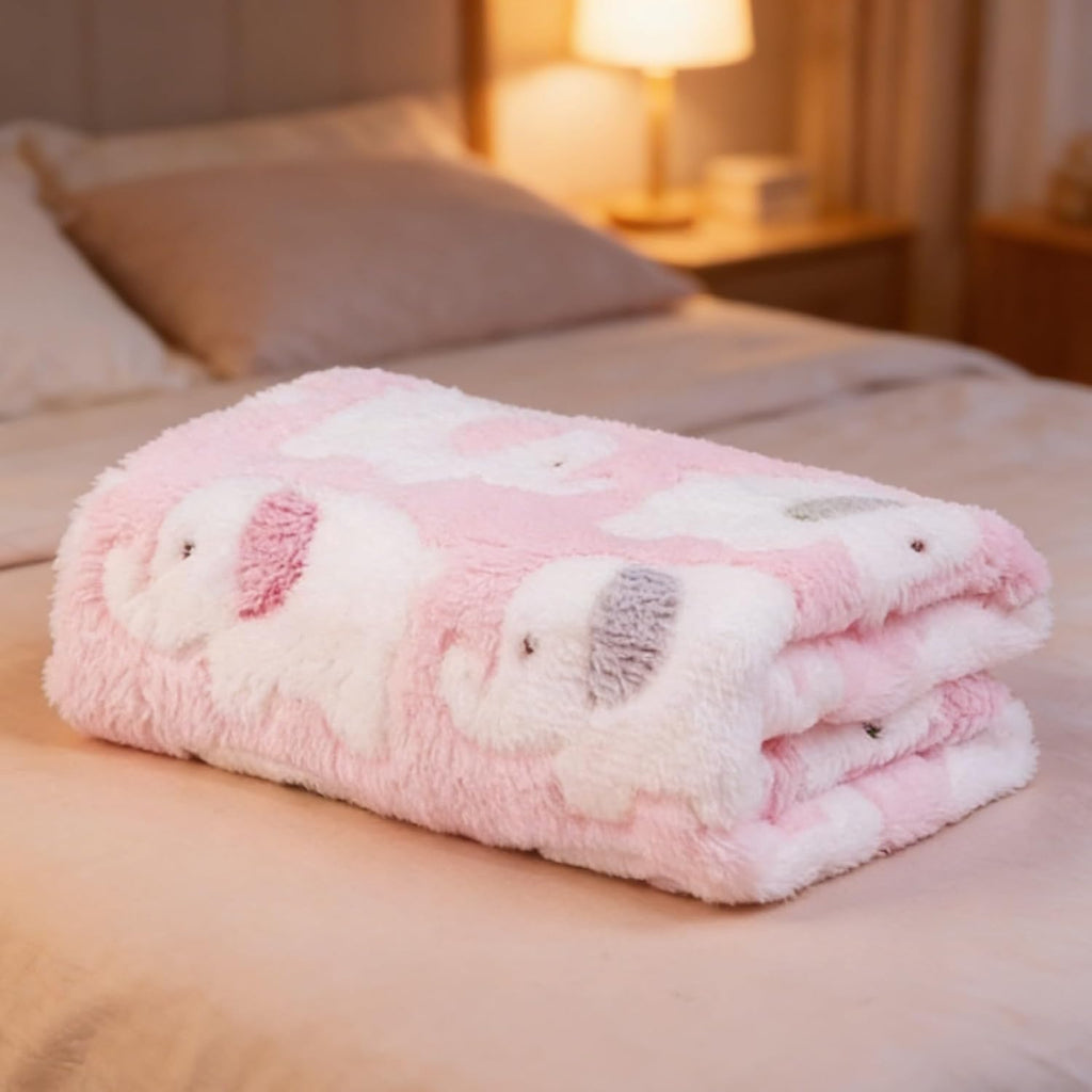 Small imported pet blanket folded gently showing the soft texture.