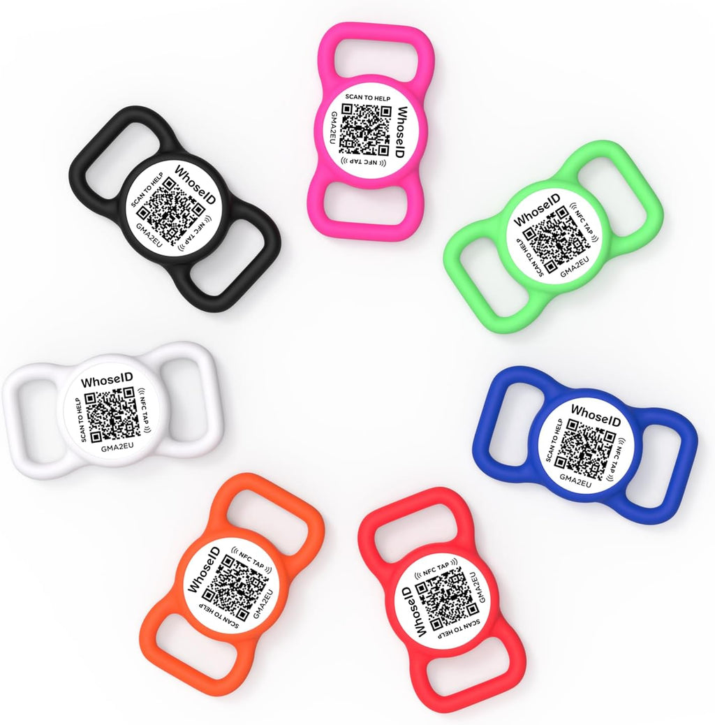 Small black and white silent pet identity tag attached to a standard dog collar to illustrate its jingle free design.