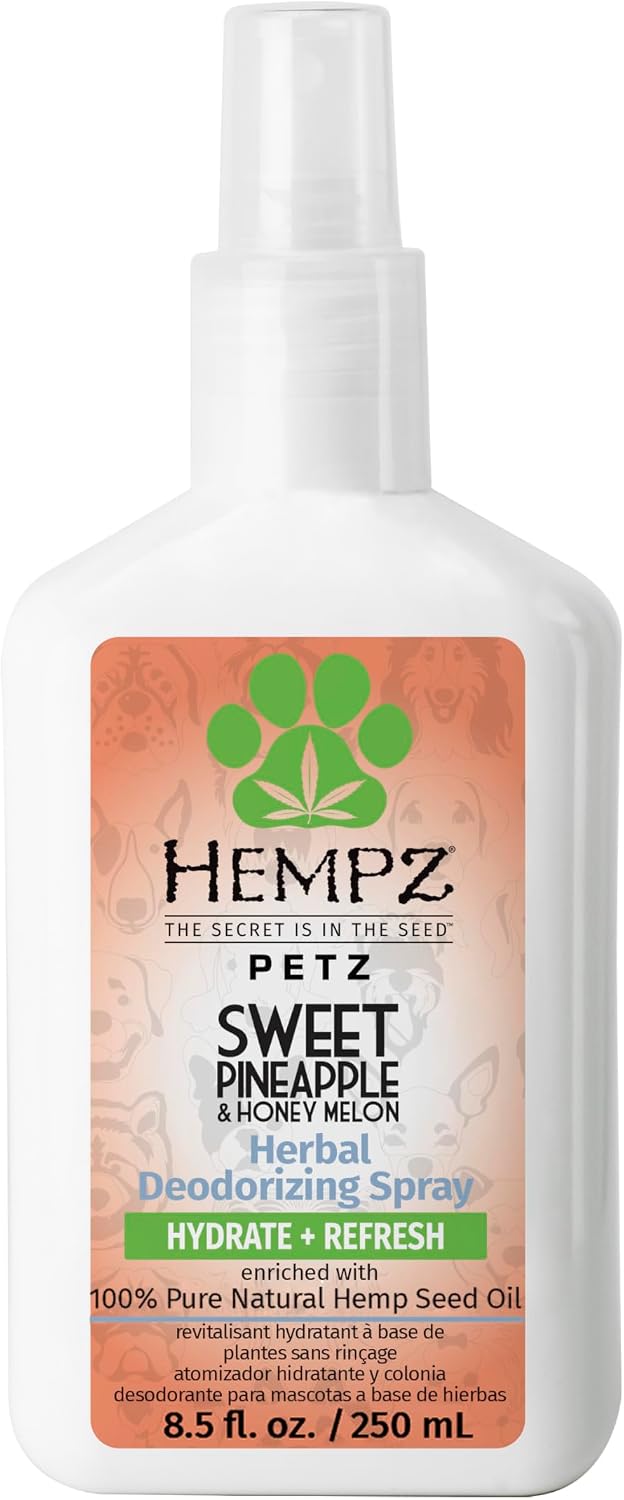 A happy dog with a shiny coat showcasing the results of the Hempz Petz deodorizing spray.