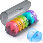 Sukuos large weekly pill organizer front view showing seven rainbow colored daily medicine boxes inside a translucent gray case
